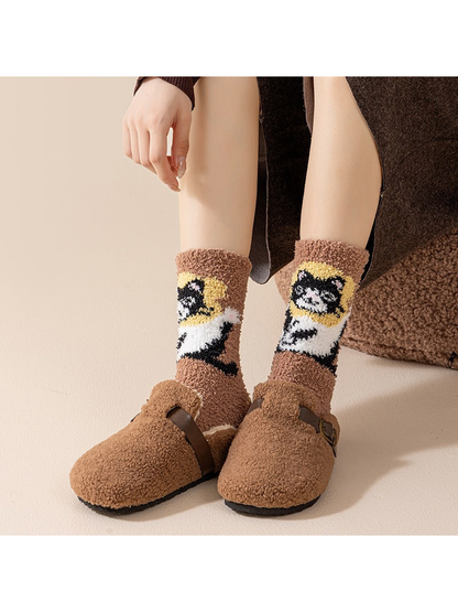 Brown animal-pattern crew socks worn with matching slippers
