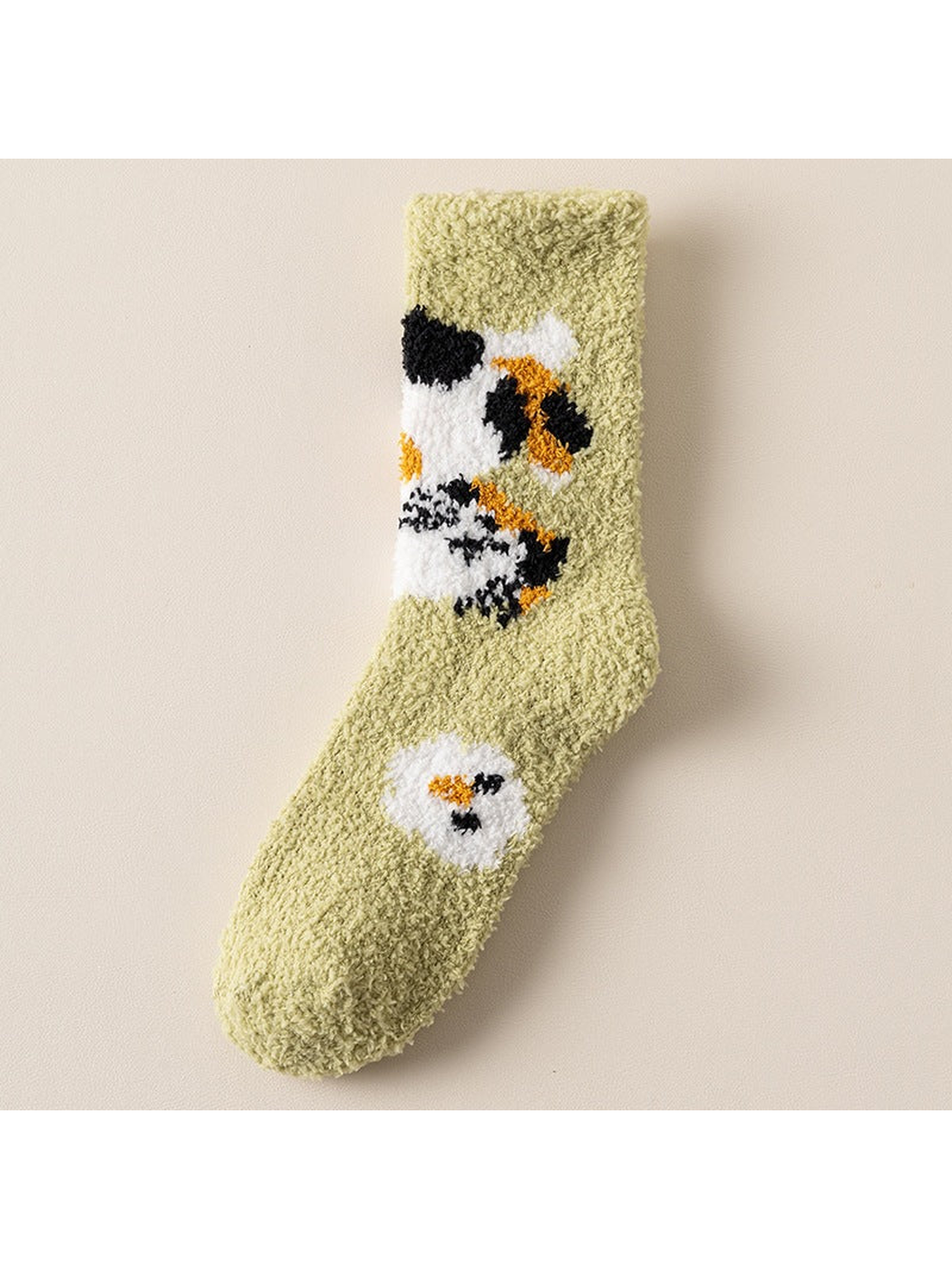 Green crew sock with black, white and orange animal motif