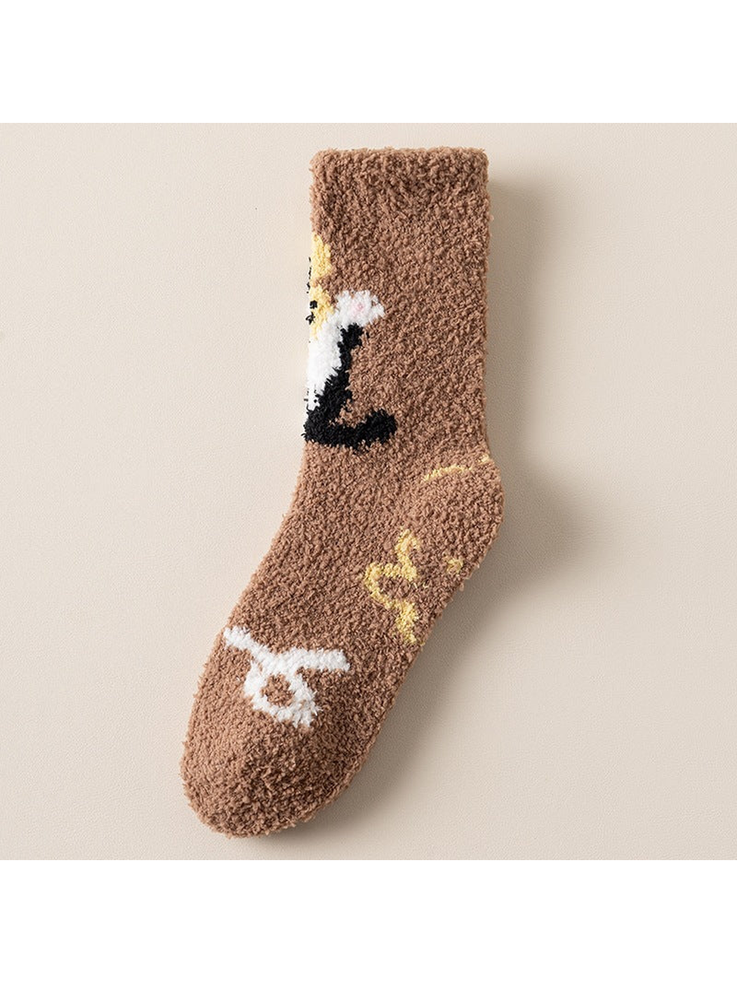 Brown crew sock with black-and-white animal motif on a yellow panel