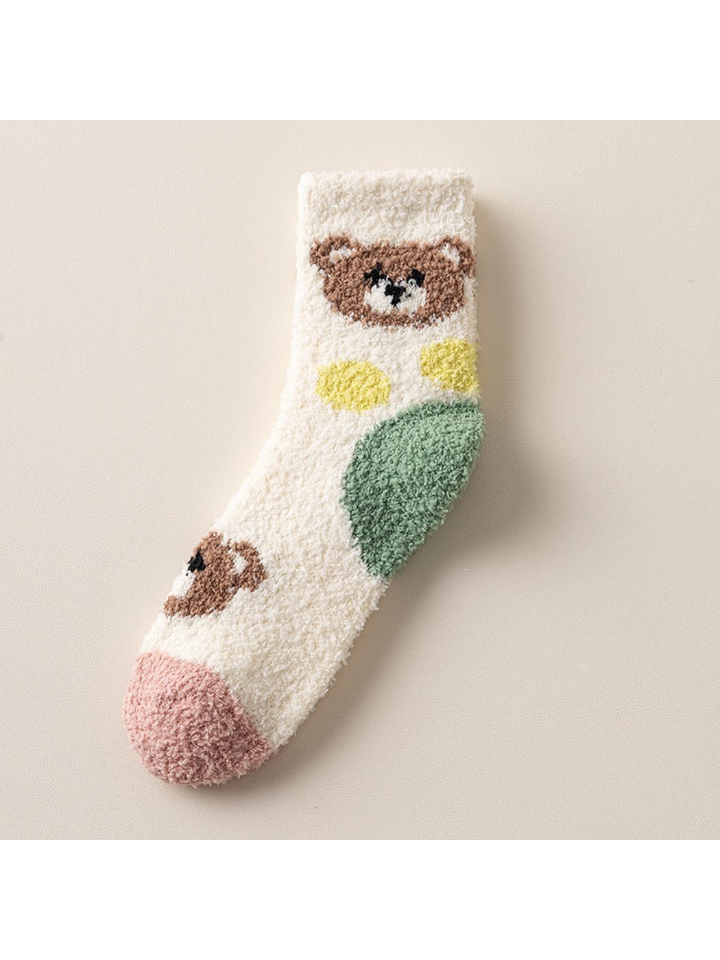 Ivory fuzzy crew sock with brown bear, green leaf and pink toe motifs