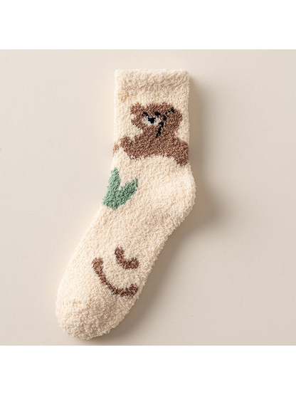 Ivory fuzzy crew sock with brown bear, green leaf and smiling face motifs