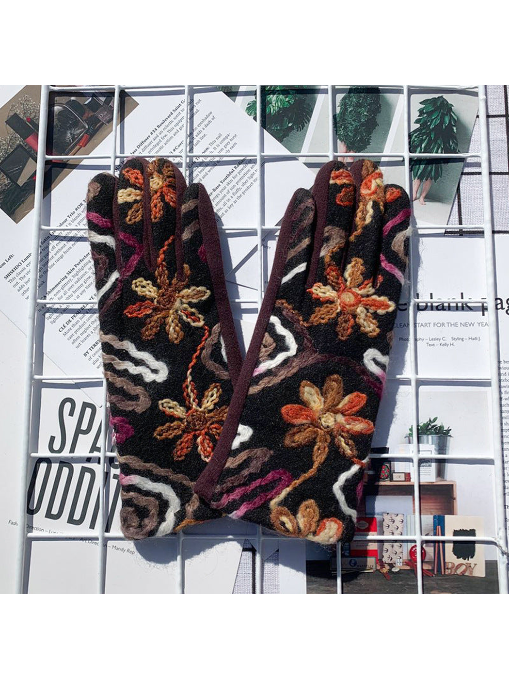 Brown floral gloves with raised multicolor decoration, back view