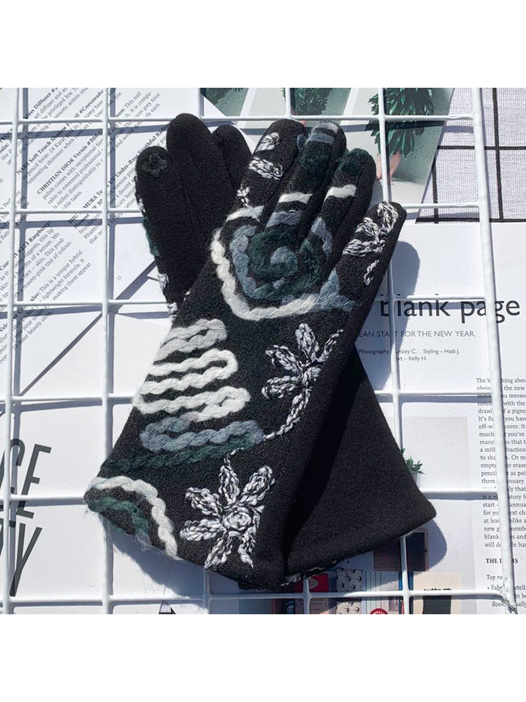 Black and gray floral gloves showing both decorated backs
