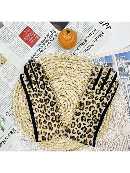 Cream leopard-print gloves displayed as a pair