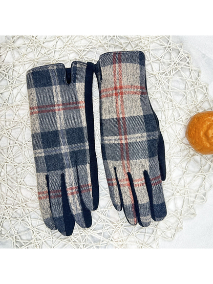 Plaid gloves laid side by side with dark contrast edging