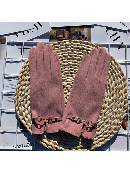 Pink five-finger gloves with decorative wrist straps