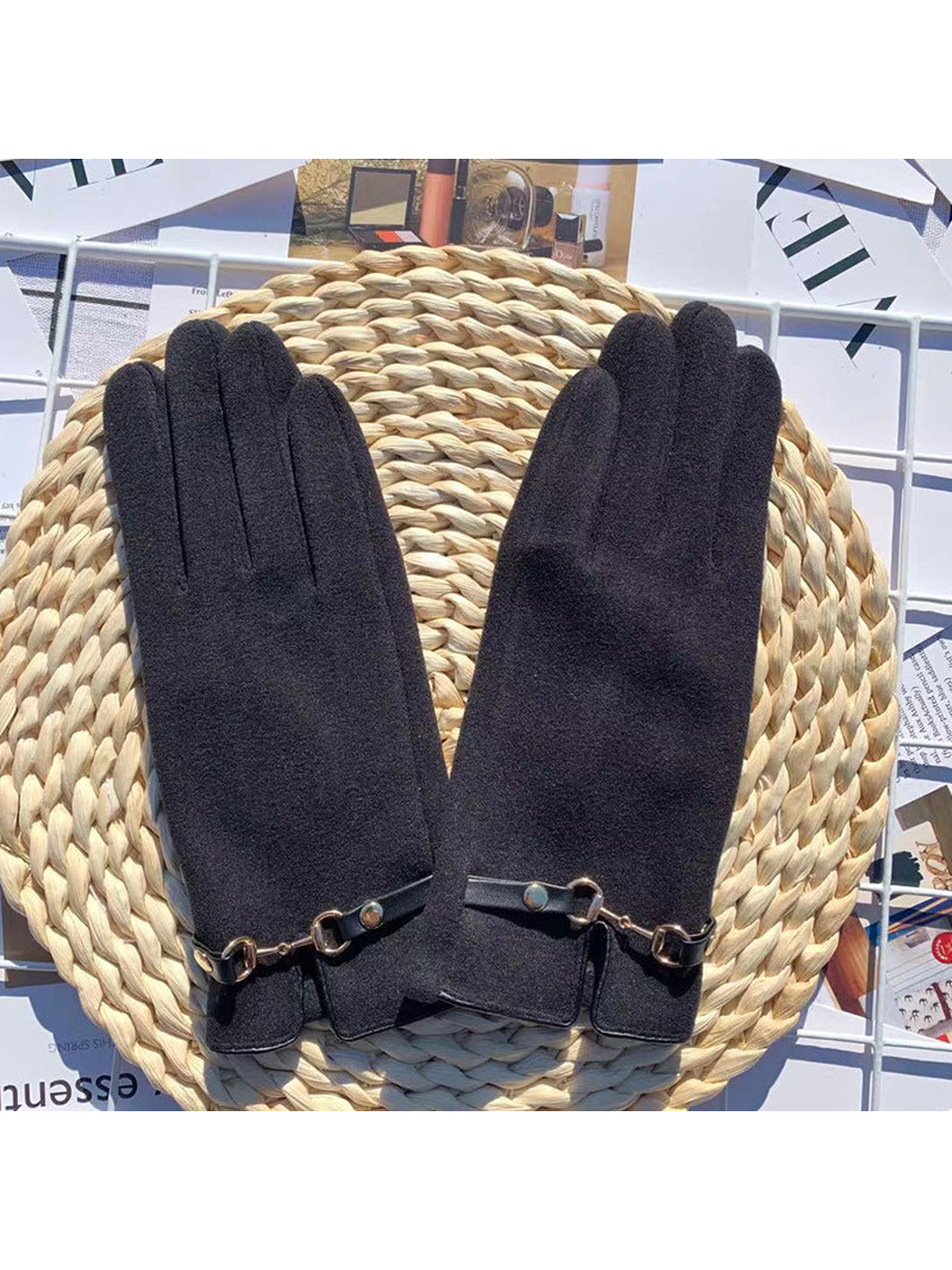 Black five-finger gloves with decorative wrist straps