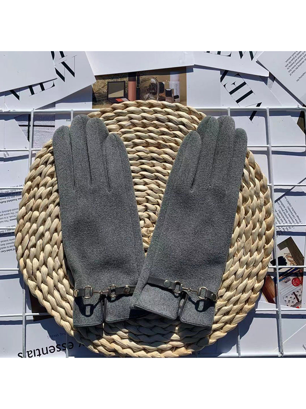 Gray five-finger gloves with decorative wrist straps