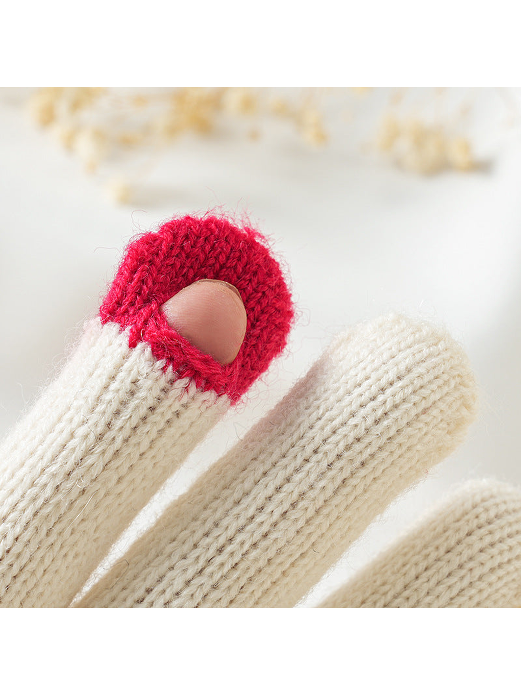 Close-up of the opening in a contrasting red fingertip