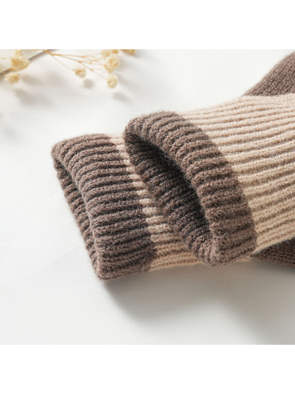 Close-up of the folded ribbed hand cover and knit glove layer