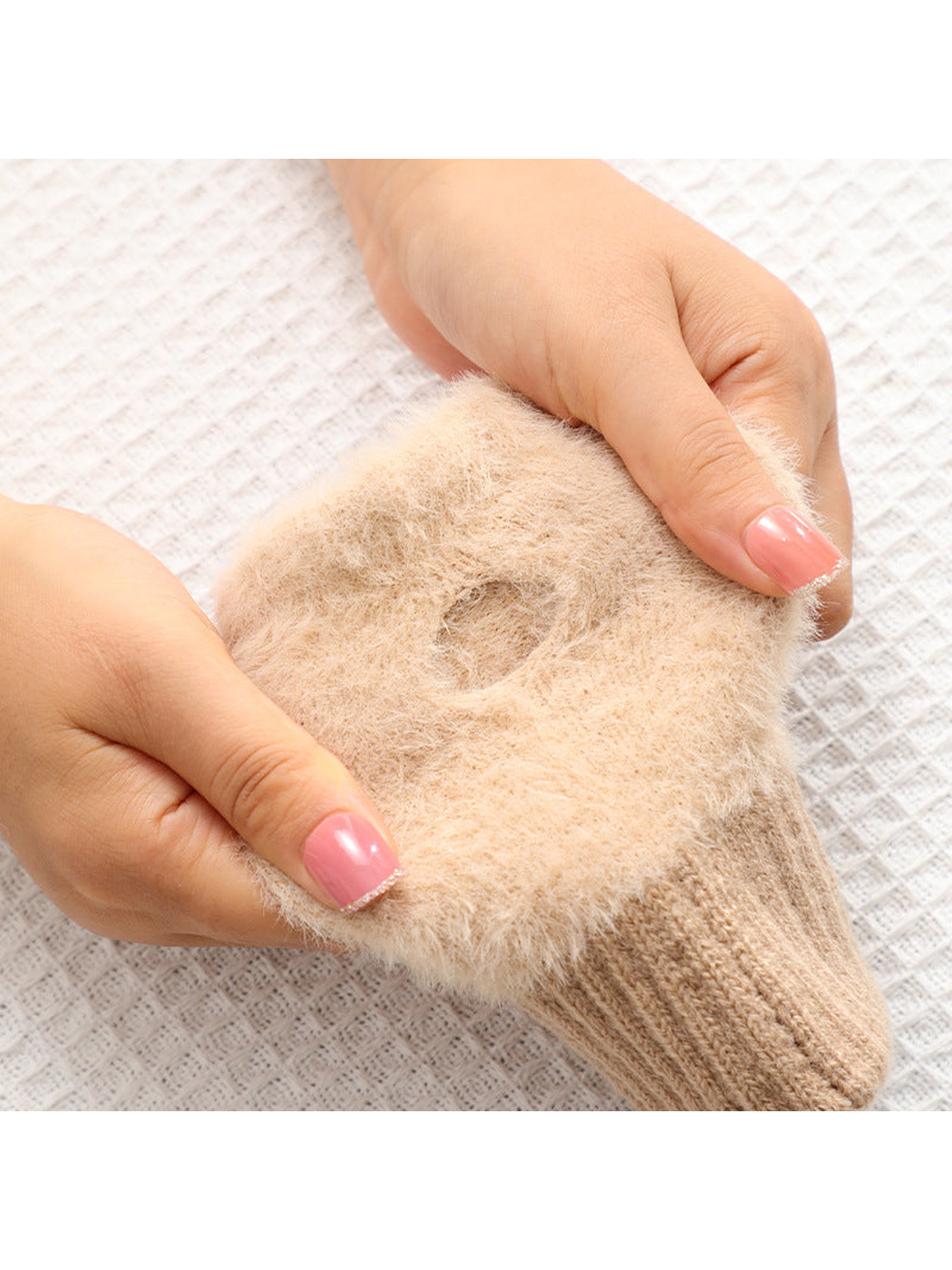 Close-up of the thumb opening and fuzzy texture
