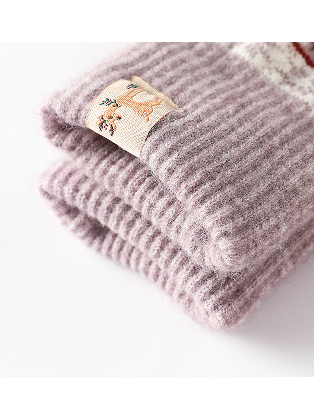 Close-up of the ribbed cuff and small woven patch
