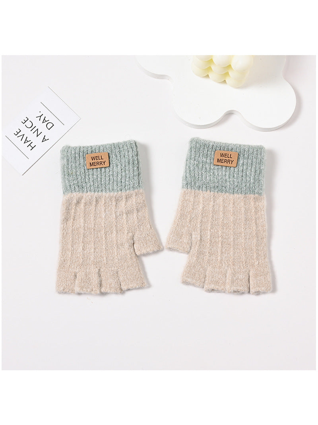 Beige fingerless gloves with muted green ribbed cuffs