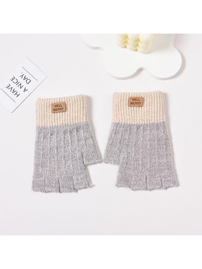 Light gray fingerless gloves with cream ribbed cuffs