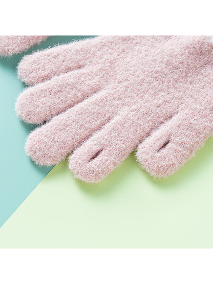 Close-up of the pink glove fingertips with two small openings
