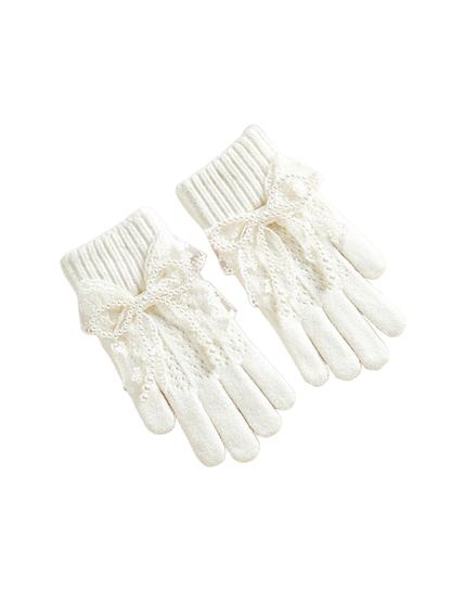 White gloves with ribbed cuffs and lace bows
