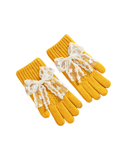 Yellow gloves with ribbed cuffs and lace bows