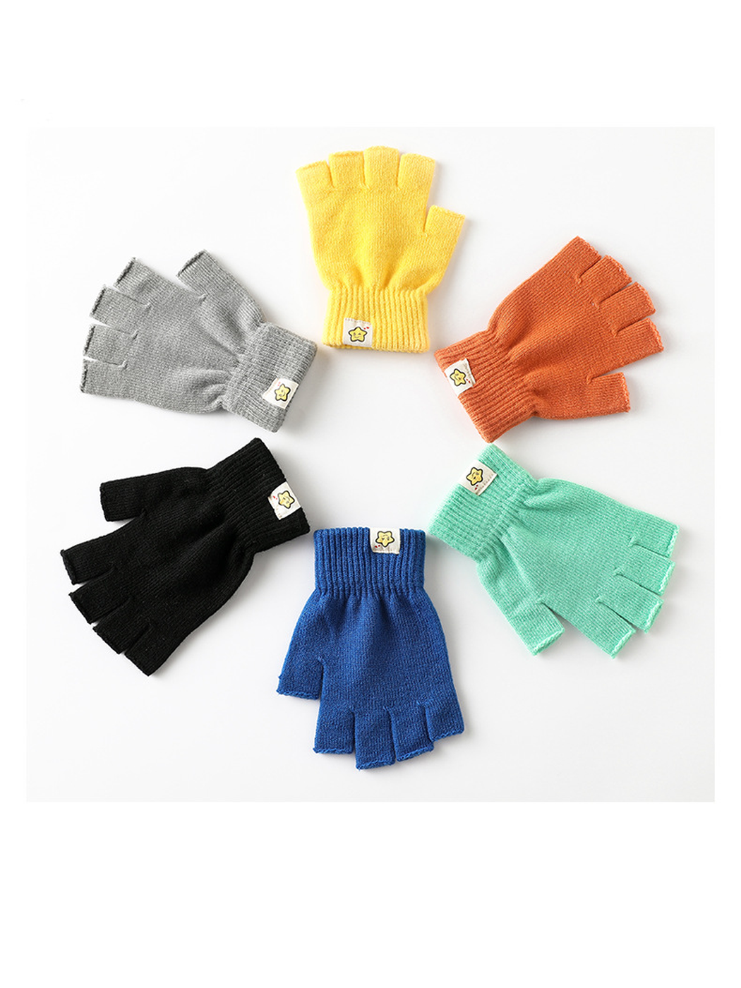 Six colors of fingerless gloves arranged on a white background