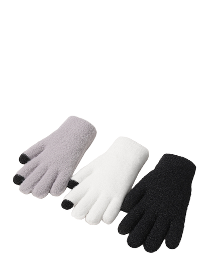 Light purple, white and black fuzzy gloves displayed together