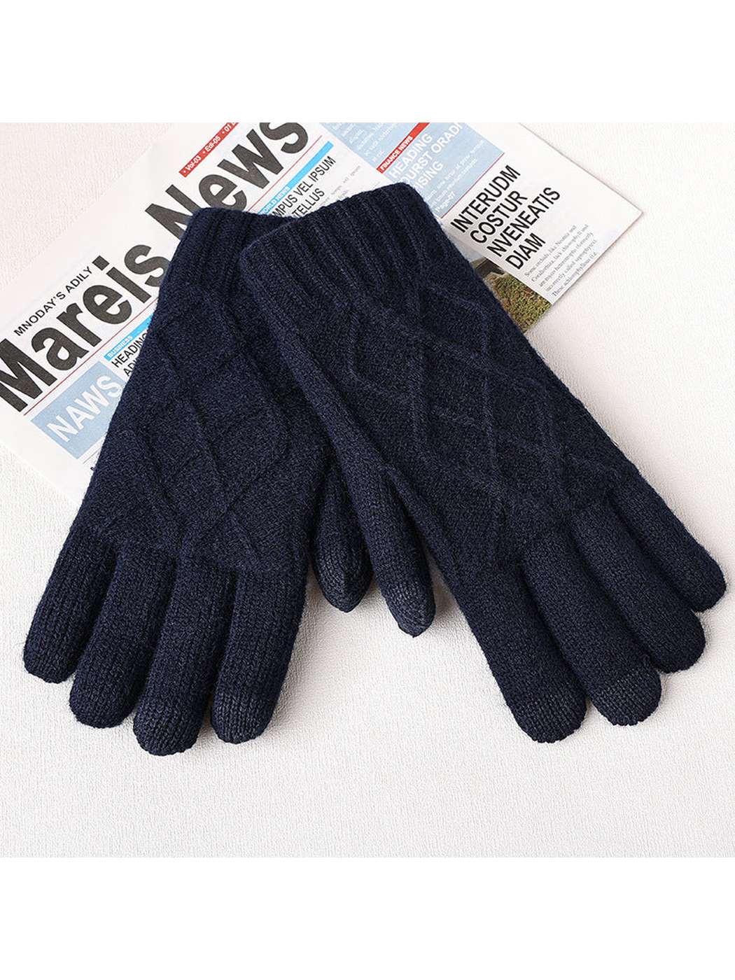 Navy diamond-knit gloves displayed as a pair