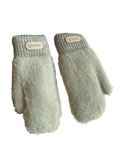 Mint green fuzzy mittens with ribbed cuffs