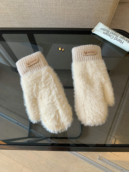 Cream fuzzy mittens with ribbed cuffs