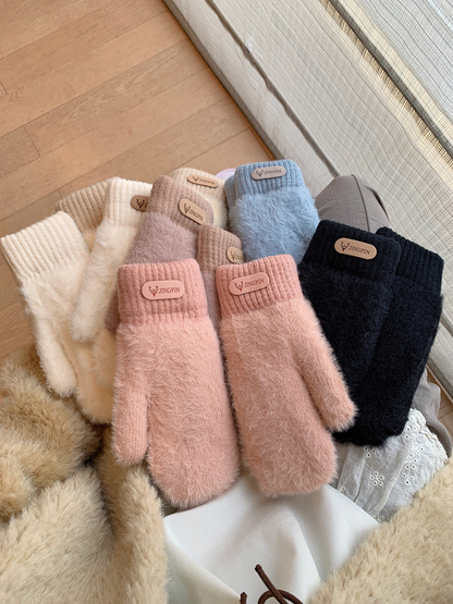 Assorted fuzzy mitten colors displayed together
