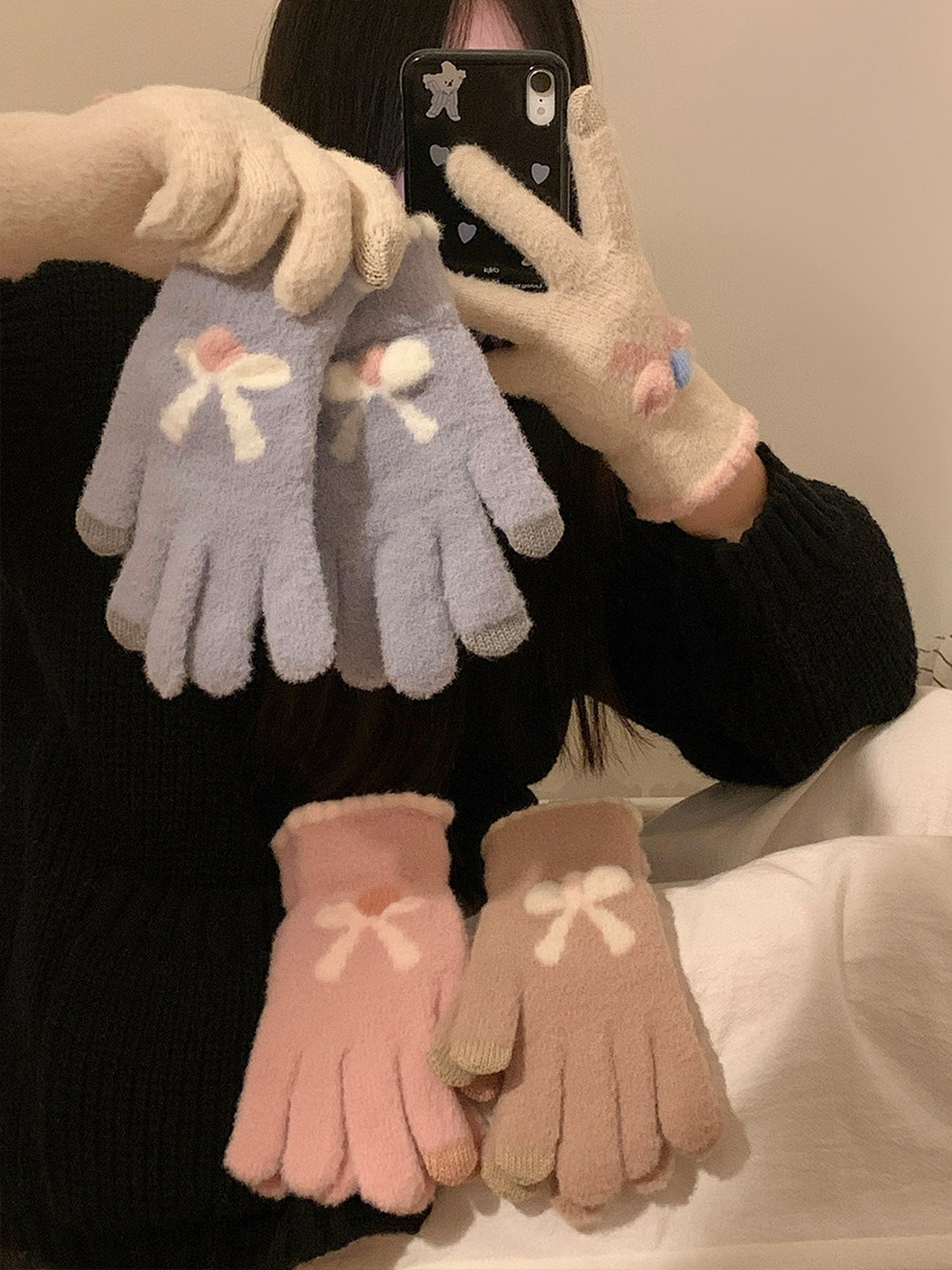 Light blue, pink, light coffee and ivory gloves displayed together