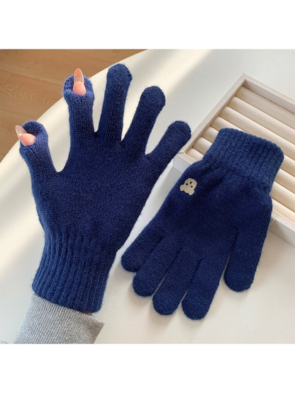Navy knit gloves with open thumb and index fingertips
