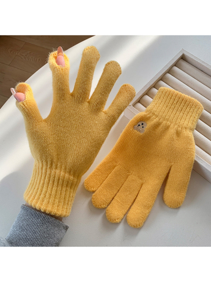 Yellow knit gloves with open thumb and index fingertips