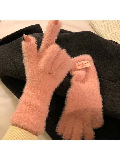 Dusty pink fuzzy gloves with thumb and index fingertip openings