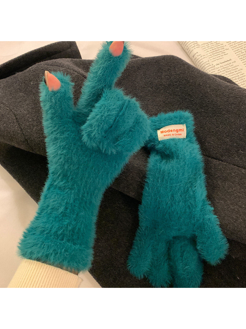 Teal fuzzy gloves with thumb and index fingertip openings