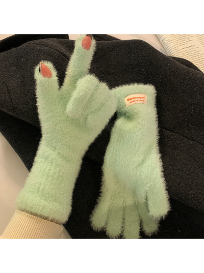 Mint green fuzzy gloves with thumb and index fingertip openings