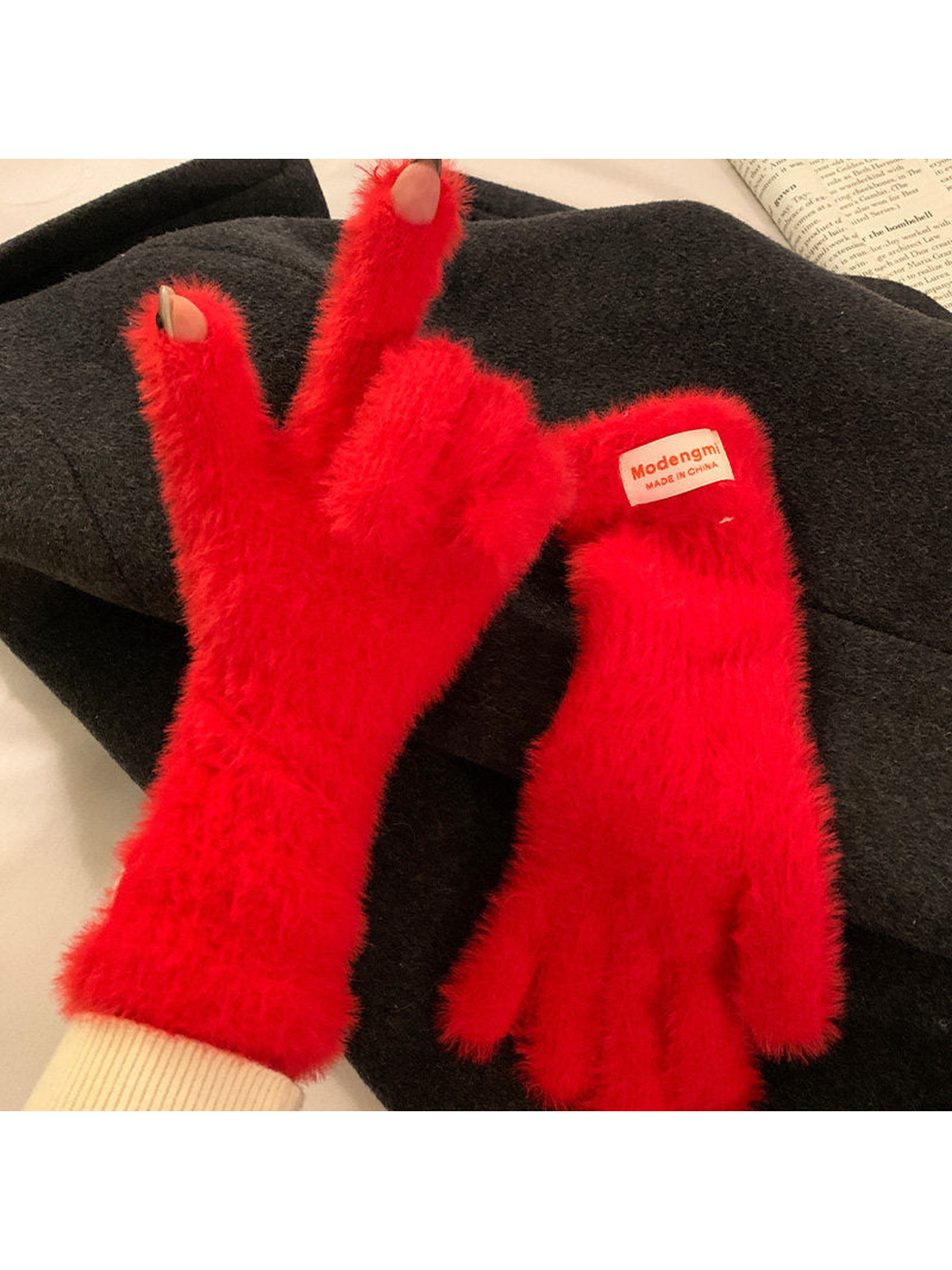 Red fuzzy gloves with thumb and index fingertip openings