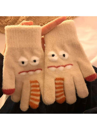 Beige fuzzy cartoon face gloves with raised eyes and striped finger details