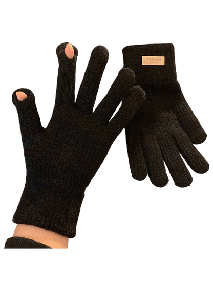 Black knit gloves with ribbed cuffs and open thumb and index fingertips