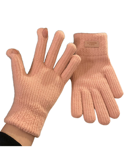 Light pink knit gloves with ribbed cuffs and open thumb and index fingertips