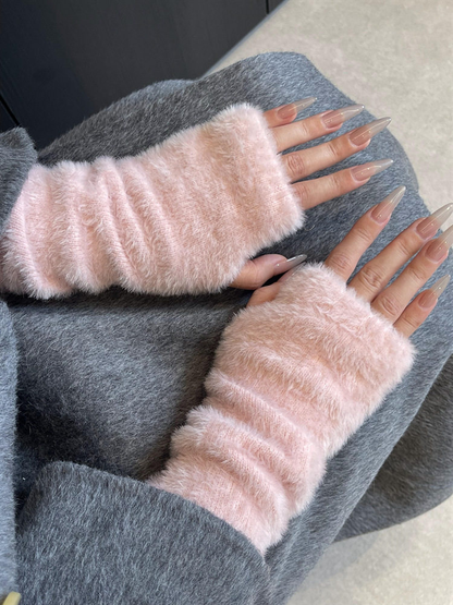 Light pink fuzzy fingerless gloves with long gathered cuffs