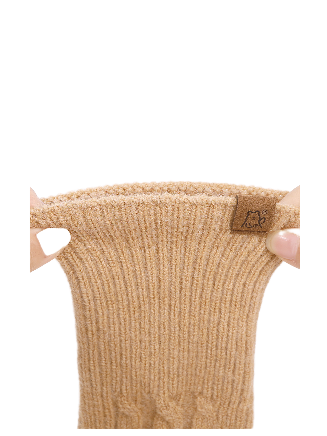Close-up of the extended ribbed glove cuff being stretched