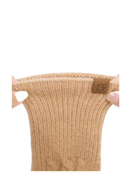Close-up of the extended ribbed glove cuff being stretched