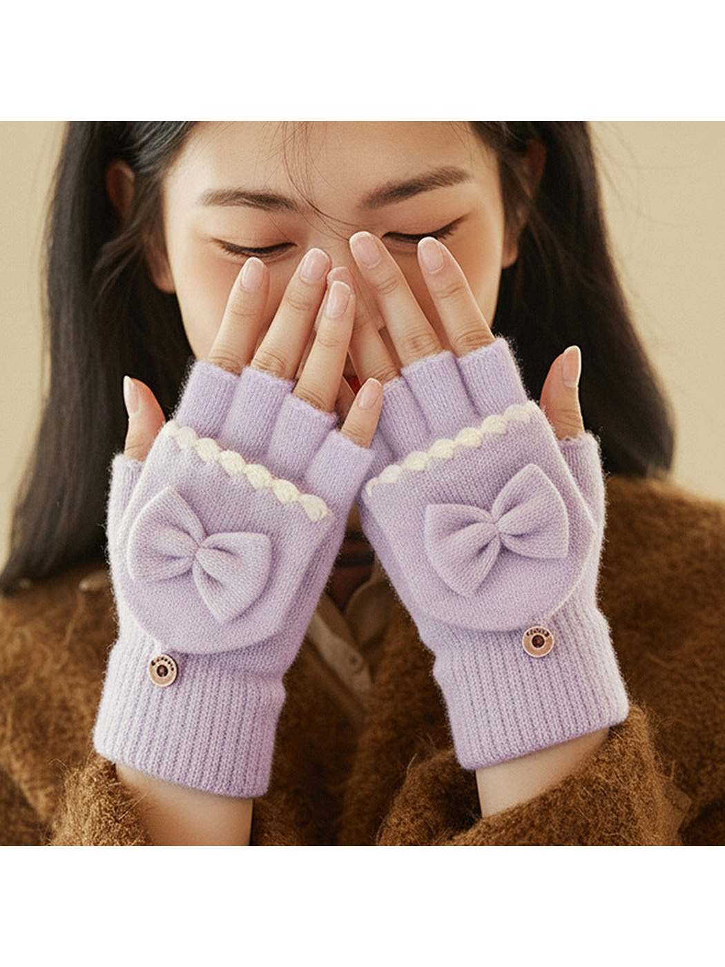 Light purple convertible bow fingerless gloves worn with the fingertips exposed
