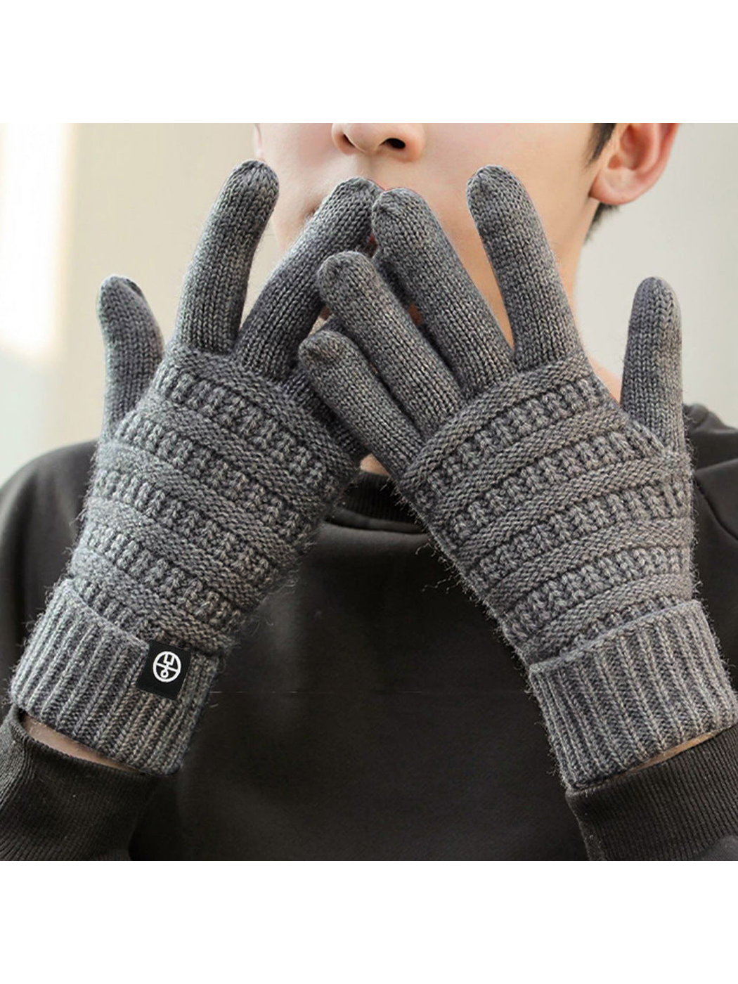 Heather gray textured knit gloves worn with extended ribbed cuffs