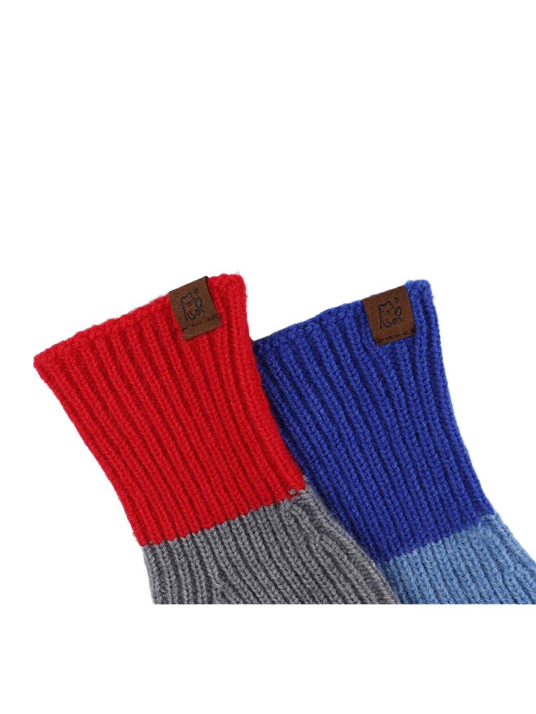 Close-up of contrasting ribbed cuffs and stitched logo patches