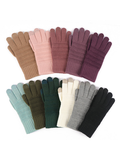 Knit gloves displayed together in multiple colors