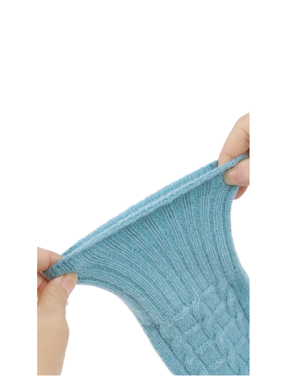 Close-up of the ribbed glove fabric being stretched