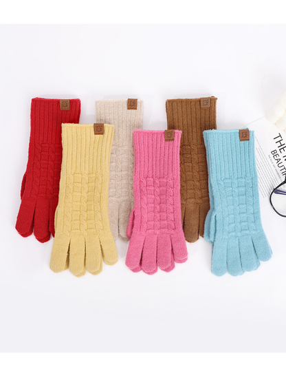 Six colors of textured gloves displayed in upright rows