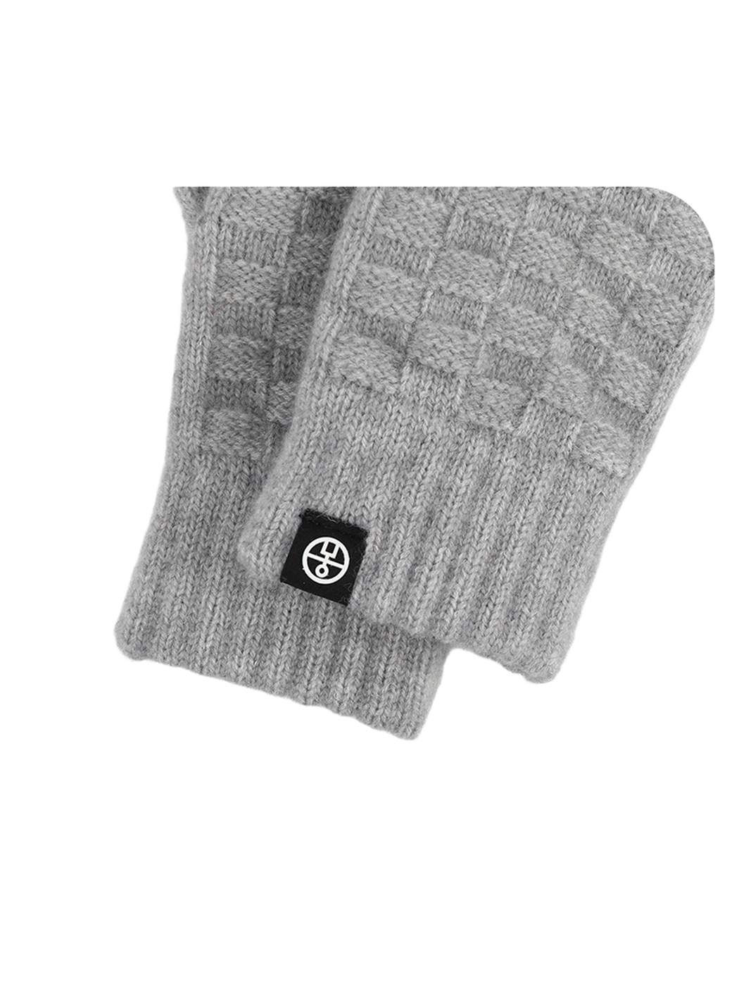 Close-up of the ribbed cuff, checkerboard knit and logo tab