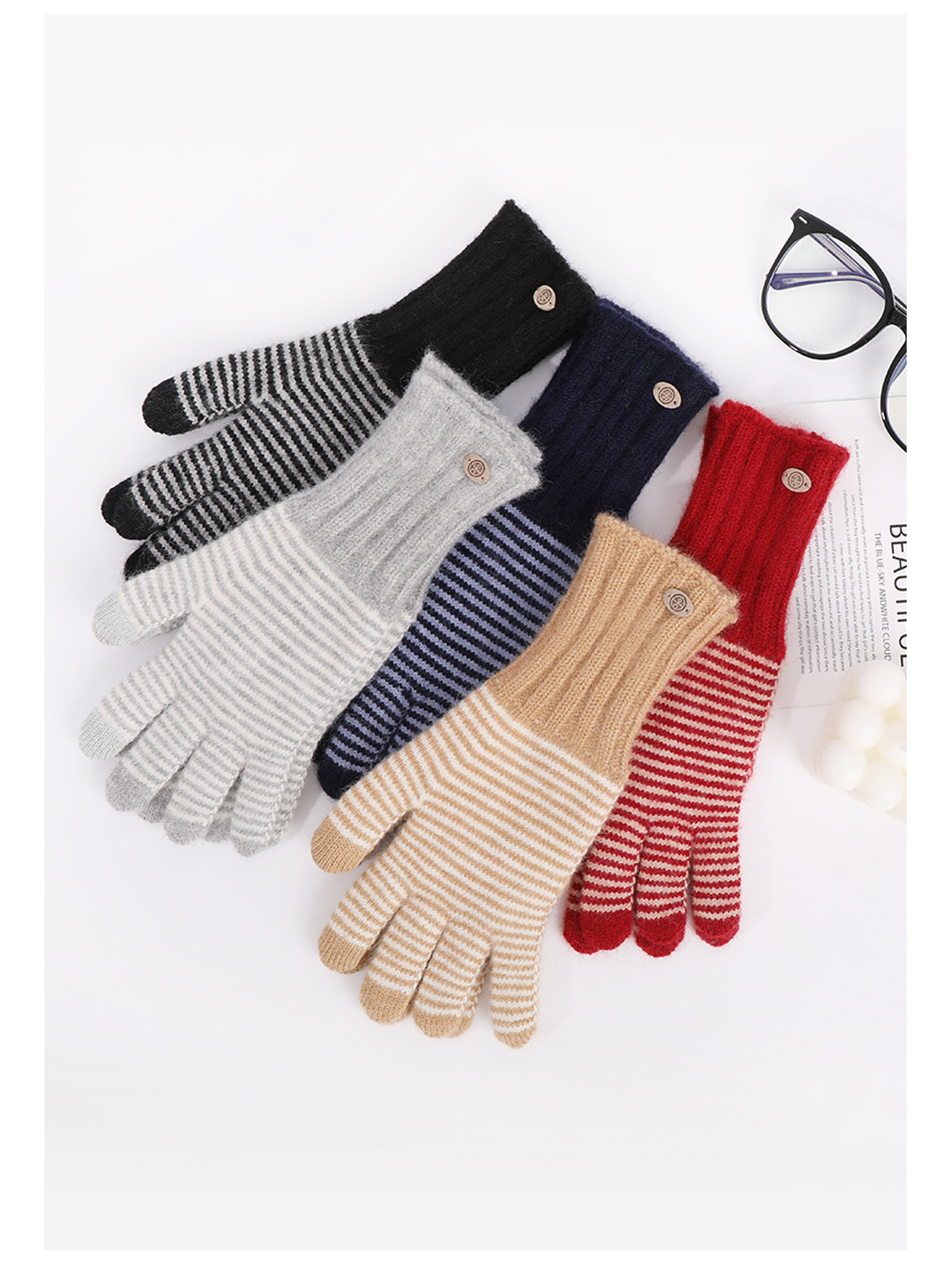 Five striped glove colors arranged together on a white surface