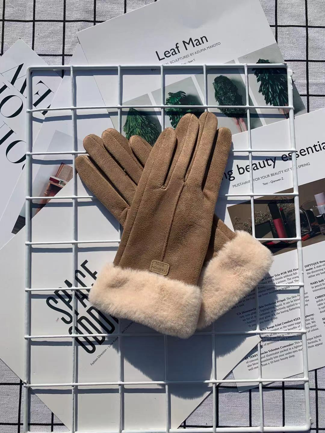 Khaki five-finger gloves with contrasting fuzzy cuffs