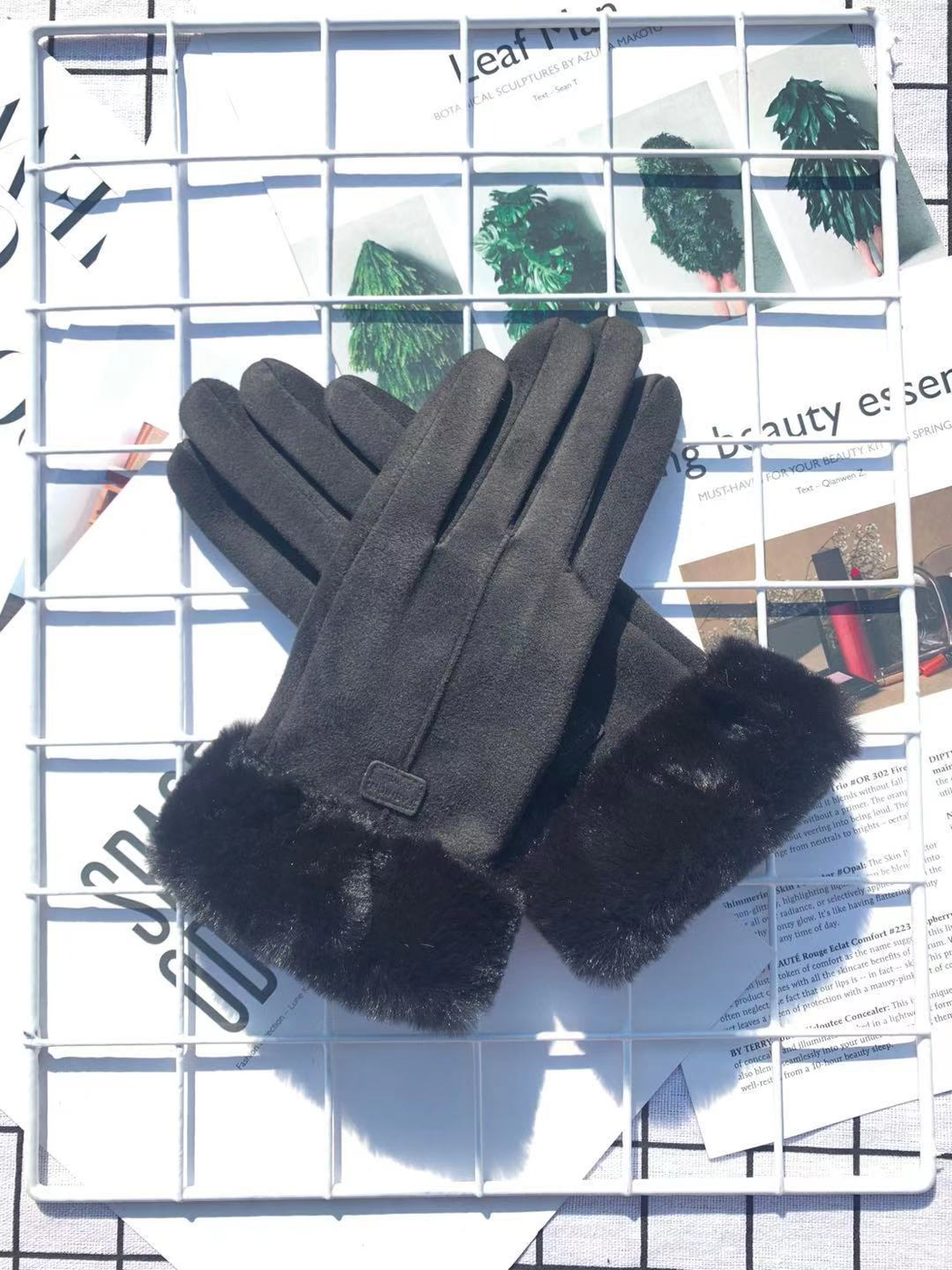 Black five-finger gloves with matching fuzzy cuffs